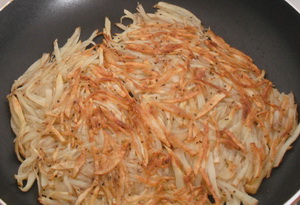 hashed potato in a pan